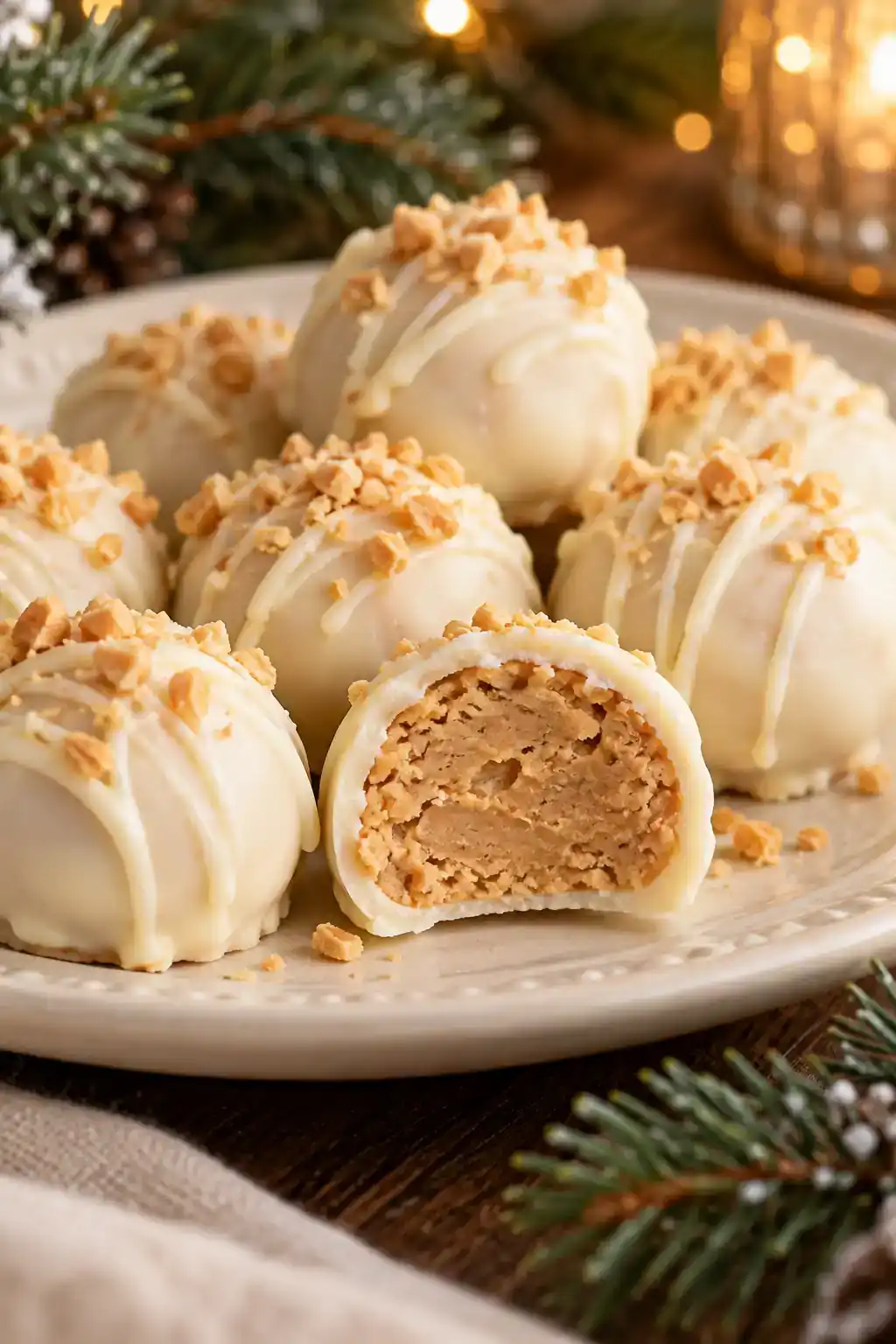 White Chocolate Peanut Butter Balls: peanut butter balls coated in white chocolate.