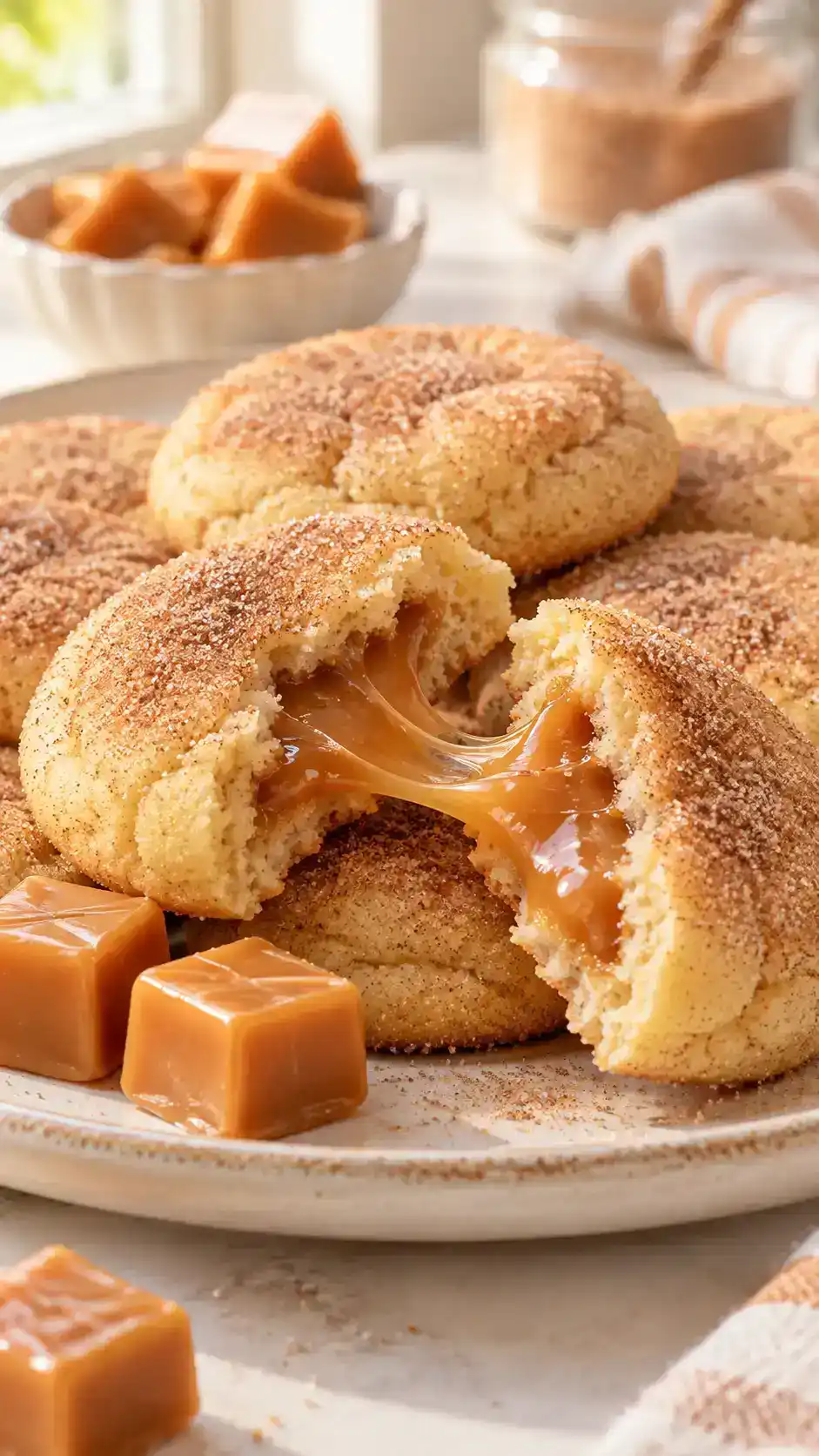 Chewy sugar cookies with a soft caramel center and a cinnamon-sugar top.