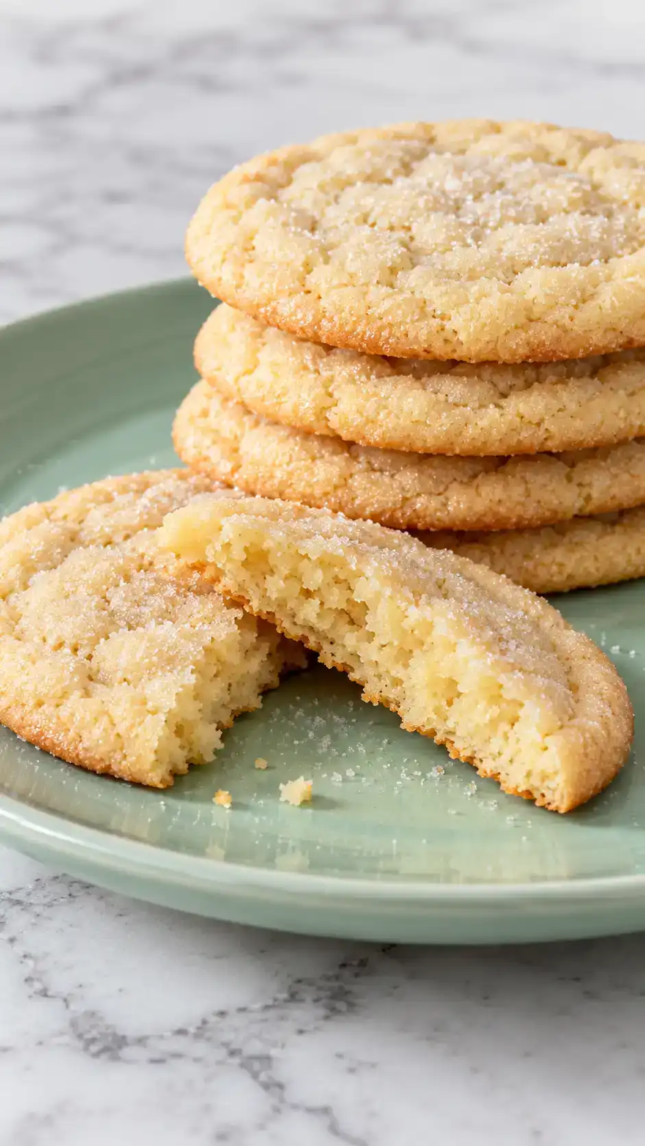 Vanilla sugar cookies with gently wrinkled tops, thin set edges and a satisfyingly chewy center.